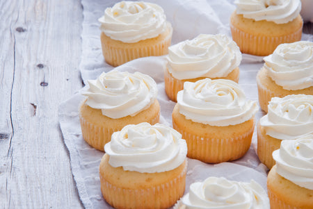 How to make Vanilla Cupcakes with Lemon Cream Cheese Frosting.